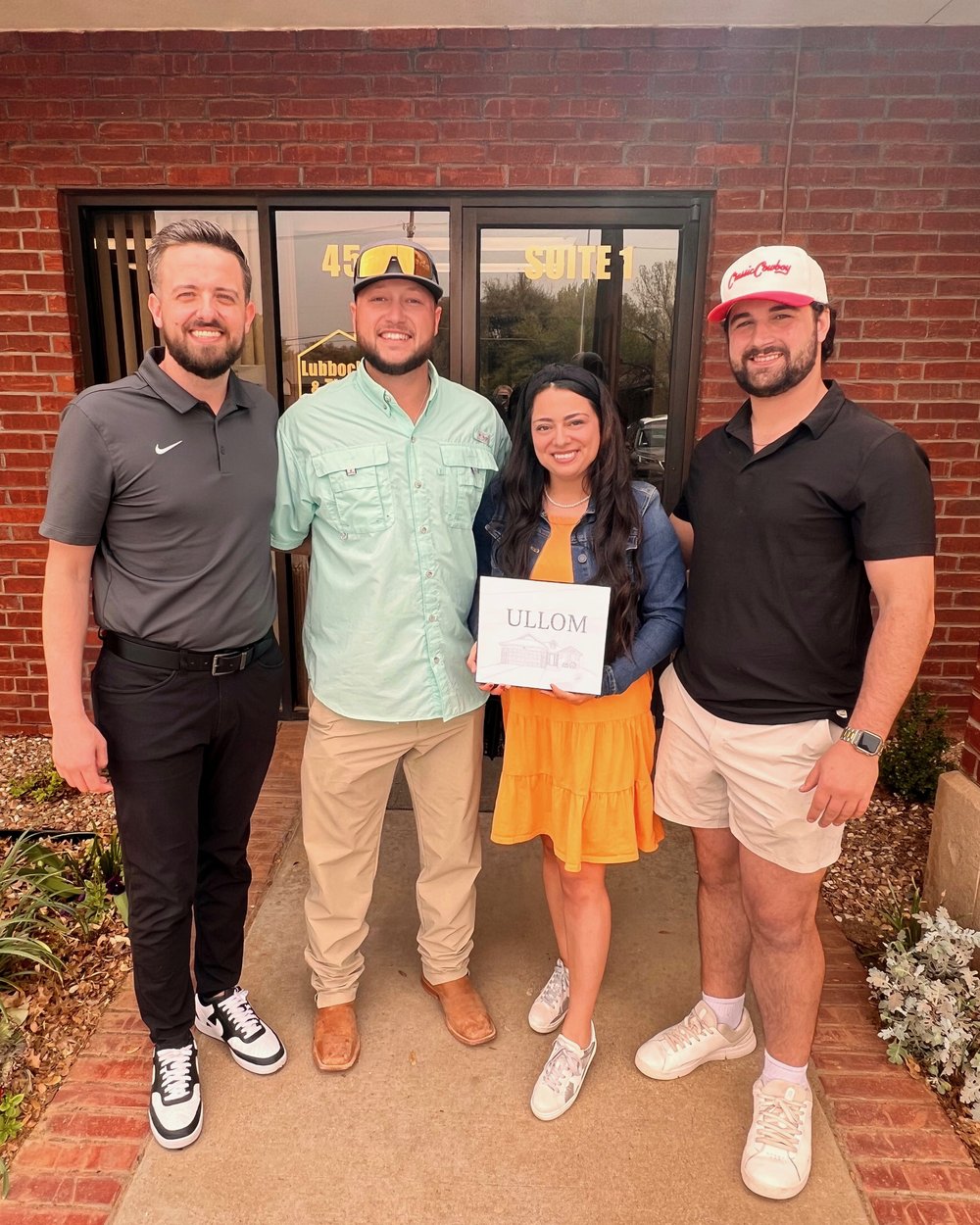 John Thomasson II with clients at their Lubbock home closing